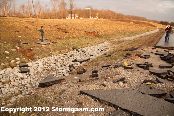 Asphalt that had been scoured from state highway 135 north of Palmyra, Indiana. Asphalt that had been scoured from state highway 135 north of Palmyra, Indiana.