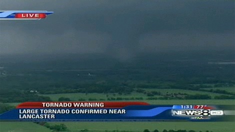Screen capture from a live Dallas, TX news feed of Lancaster (south Dallas) tornado on April 3, 2012. Screen capture from a live Dallas, TX news feed of Lancaster (south Dallas) tornado on April 3, 2012.